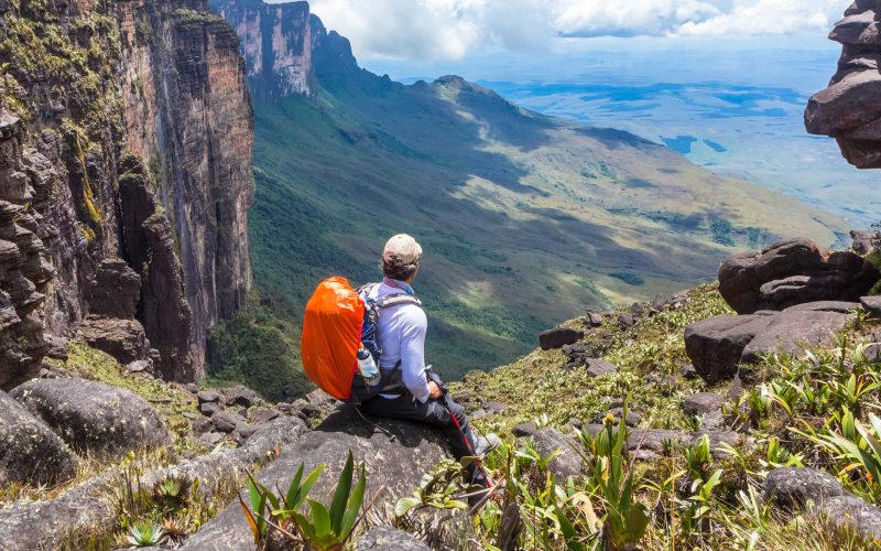 man-sitting-on-rocks-in-the-roraima-massif-istock-4131